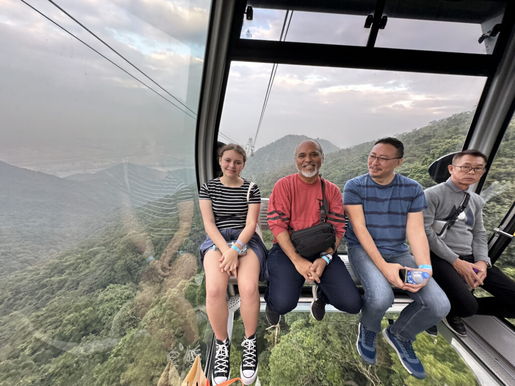 a group of people sitting on a chair