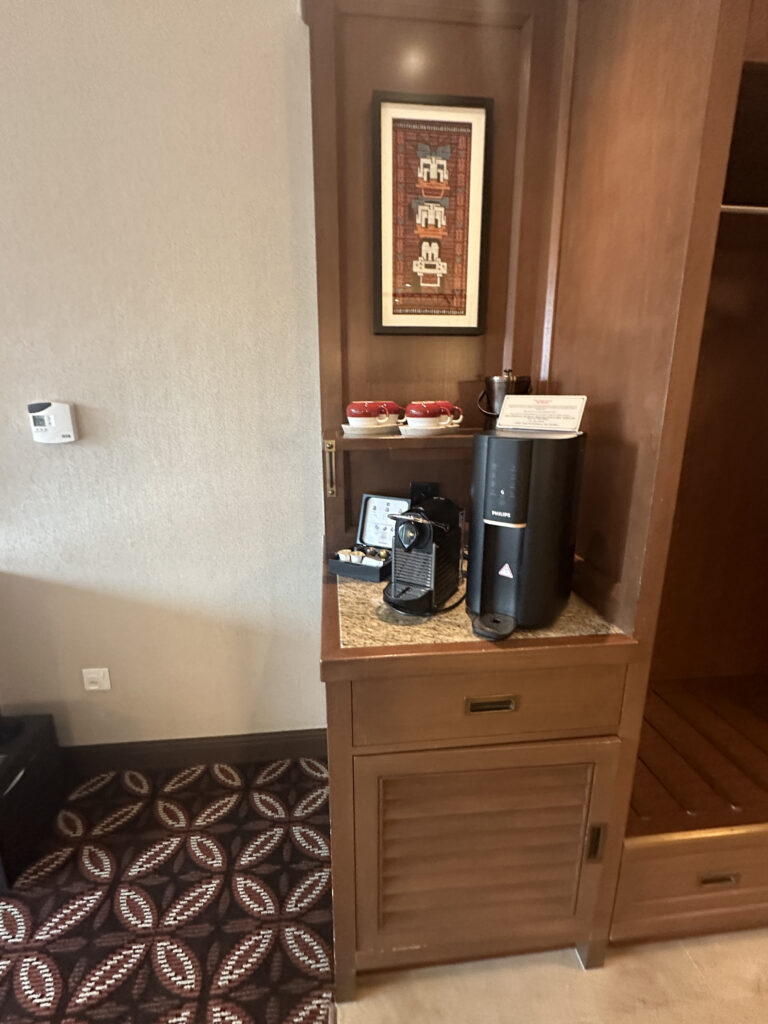 a coffee machine on a shelf