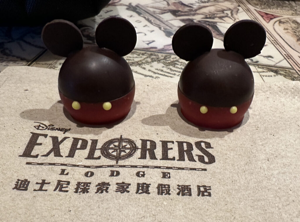 a pair of chocolate mouse heads on a paper