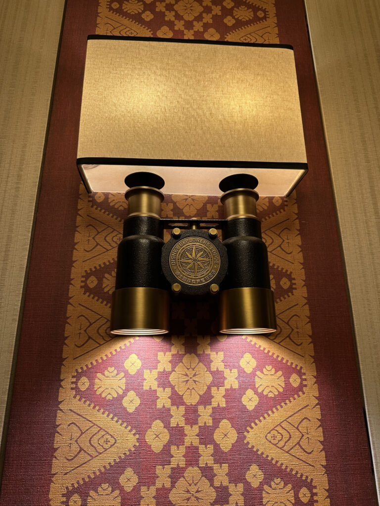 a binoculars on a rug
