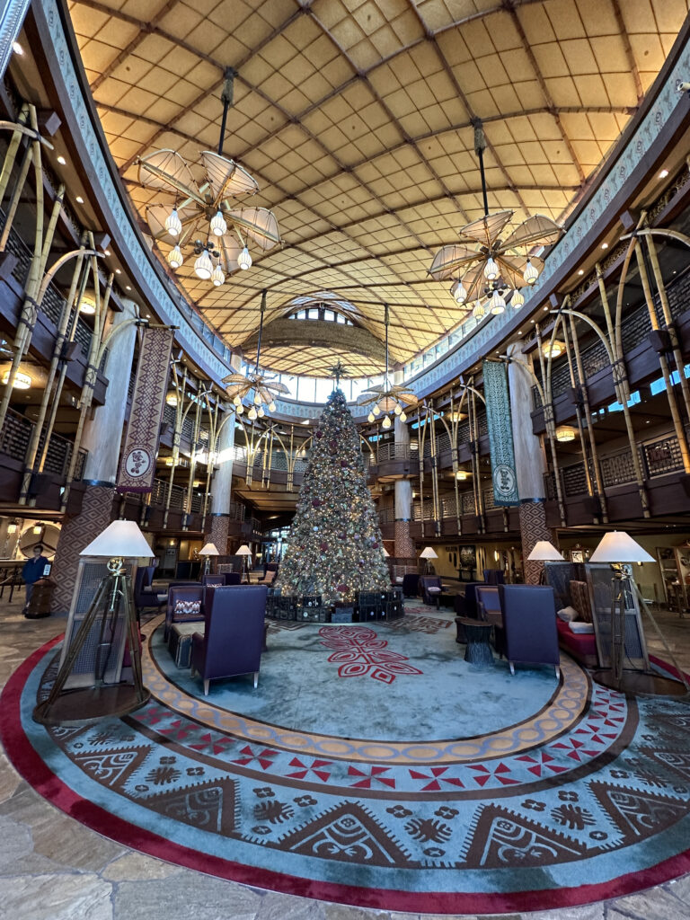 a large building with a christmas tree