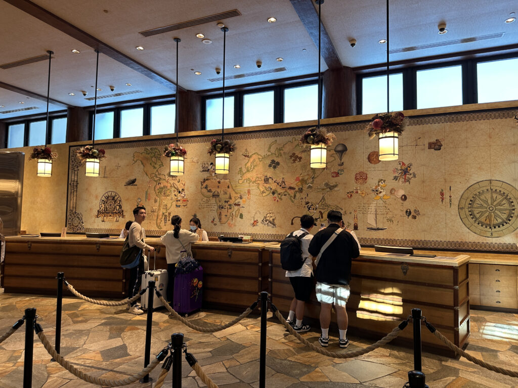 people standing in front of a reception desk