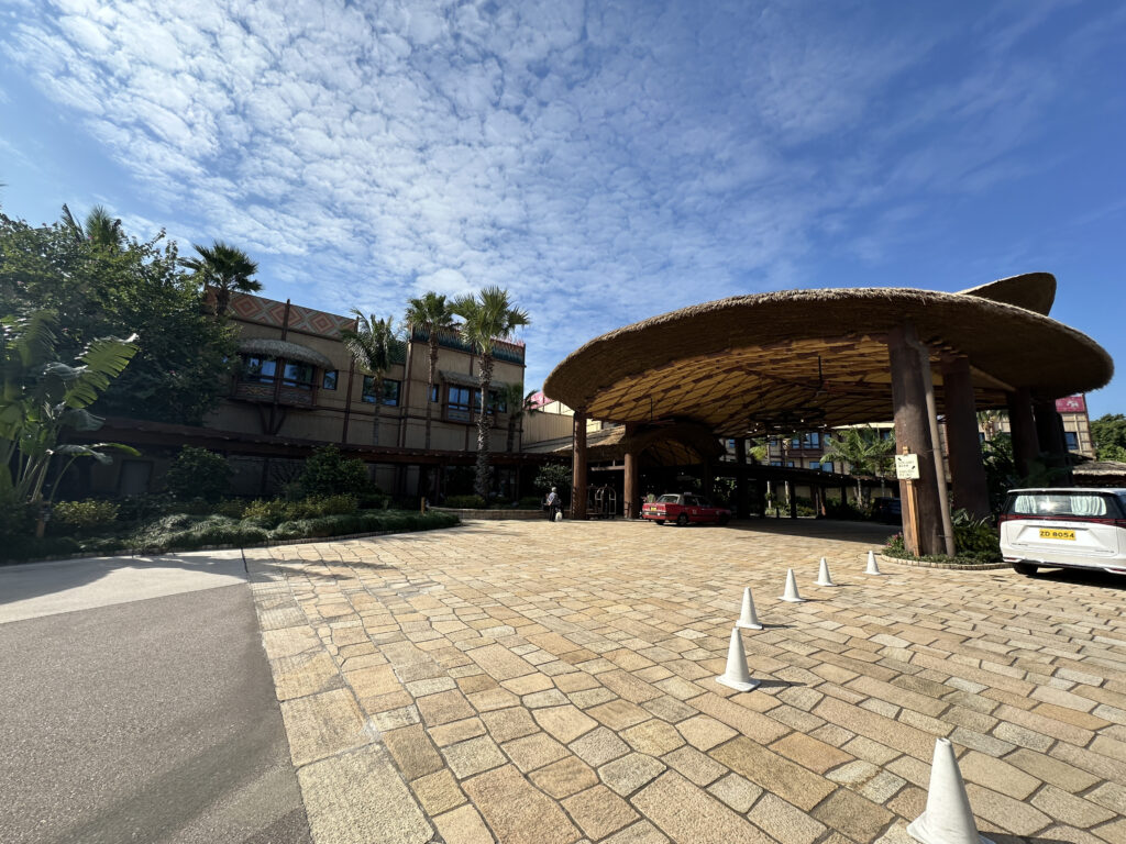 a building with a round roof and white cones
