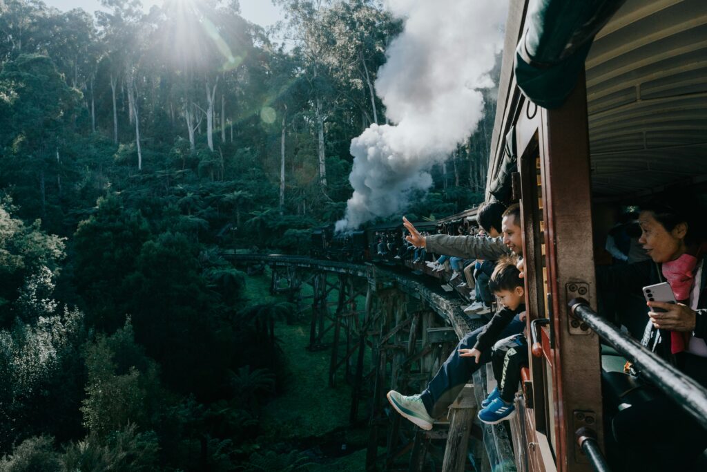 people looking out of a train window