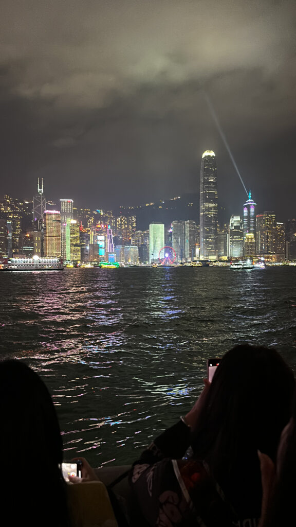 a city skyline seen from a boat