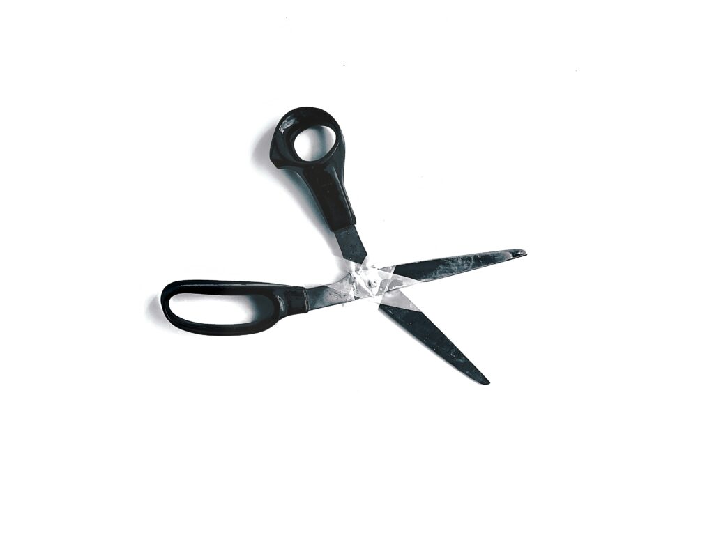 a pair of scissors with a diamond cut