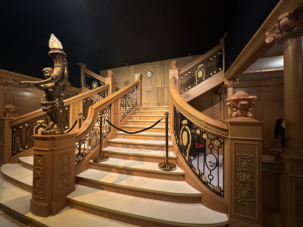 a staircase with a rope railing