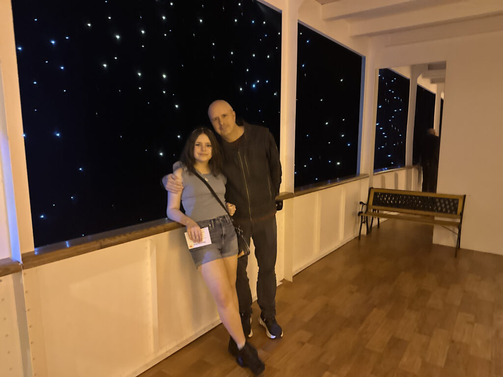 a man and woman posing for a picture