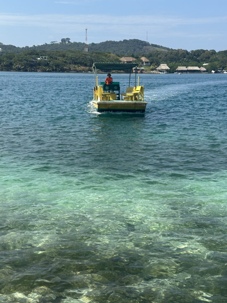 a man on a boat in the water