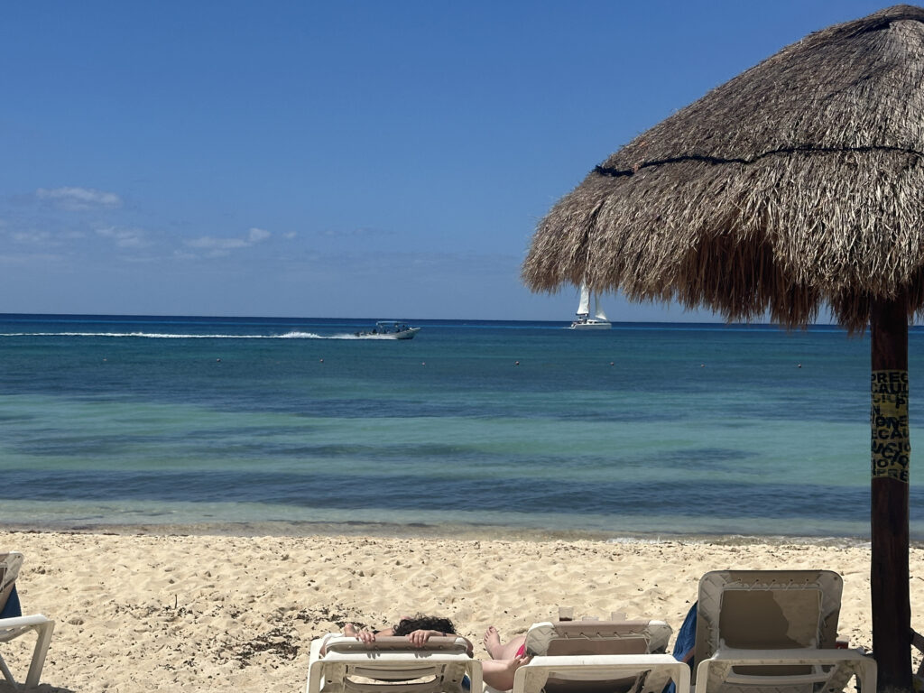 a person lying on a beach