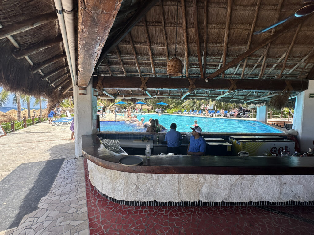 people standing at a bar