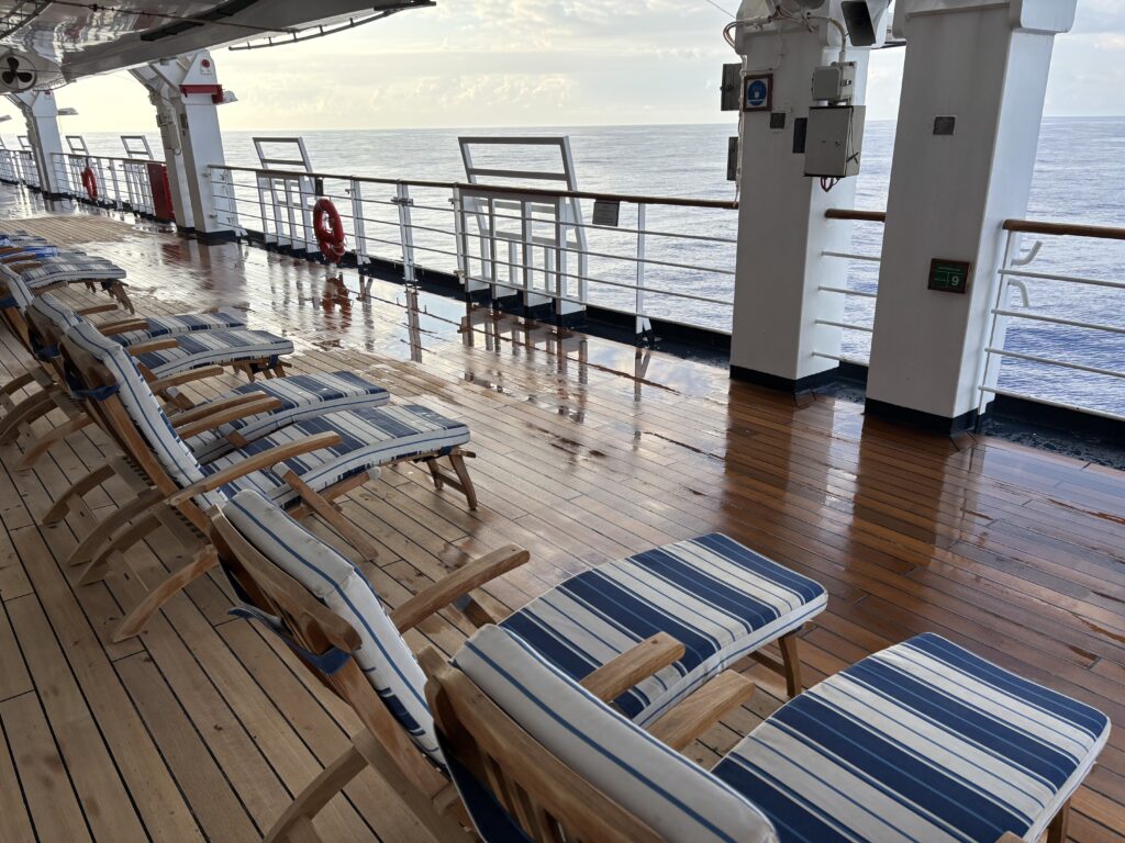 a deck with chairs on it