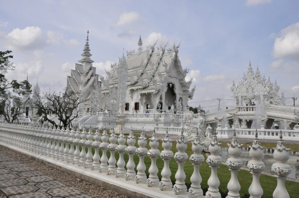 a white building with a fence