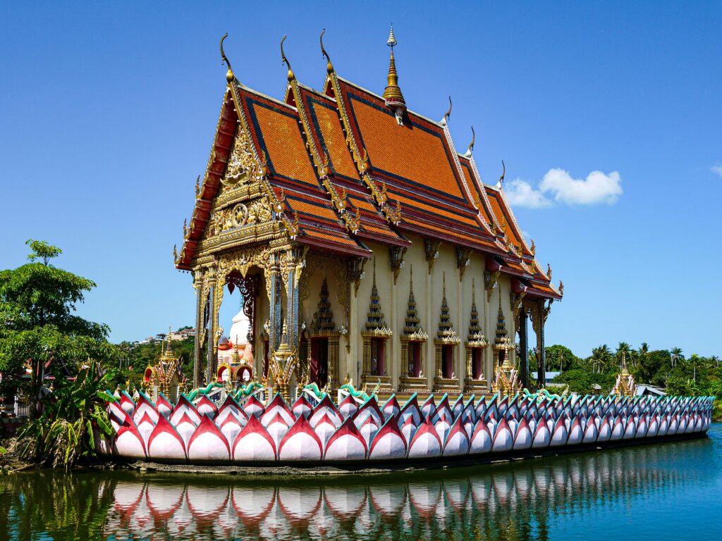 a building with a boat in the water