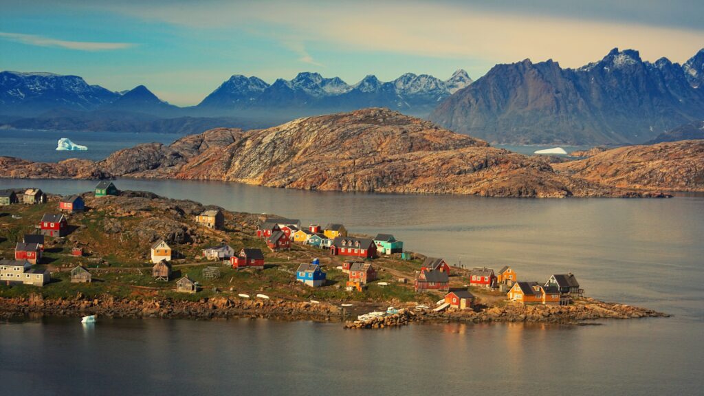 a small village on a rocky island surrounded by water