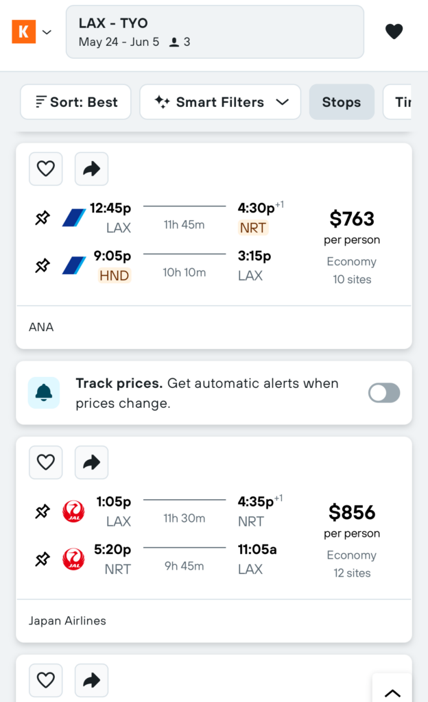 The image shows a flight search results page from a travel booking website. It displays flight options from Los Angeles (LAX) to Tokyo (TYO) for three passengers, traveling from May 24 to June 5. The first option is with ANA, departing LAX at 12:45 PM and arriving at NRT at 4:30 PM the next day, with a return flight from HND at 9:05 PM to LAX at 3:15 PM, priced at $763 per person. The second option is with Japan Airlines, departing LAX at 1:05 PM and arriving at NRT at 4:35 PM the next day, with a return flight from NRT at 5:20 PM to LAX at 11:05 AM, priced at $856 per person. There are options to sort and filter the results, and a toggle to track prices. An advertisement at the bottom suggests comparing prices on other sites like justfly.com and cheapticketsdeal.